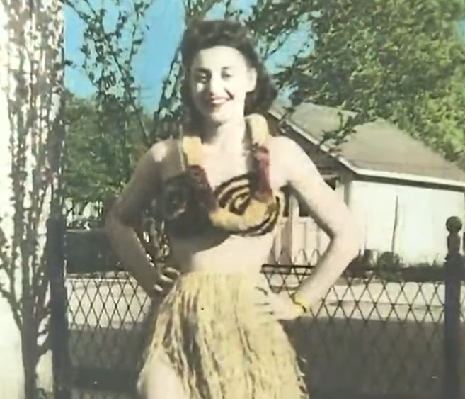 June Malicote in 1945 wearing a grass skirt from Hawaii
