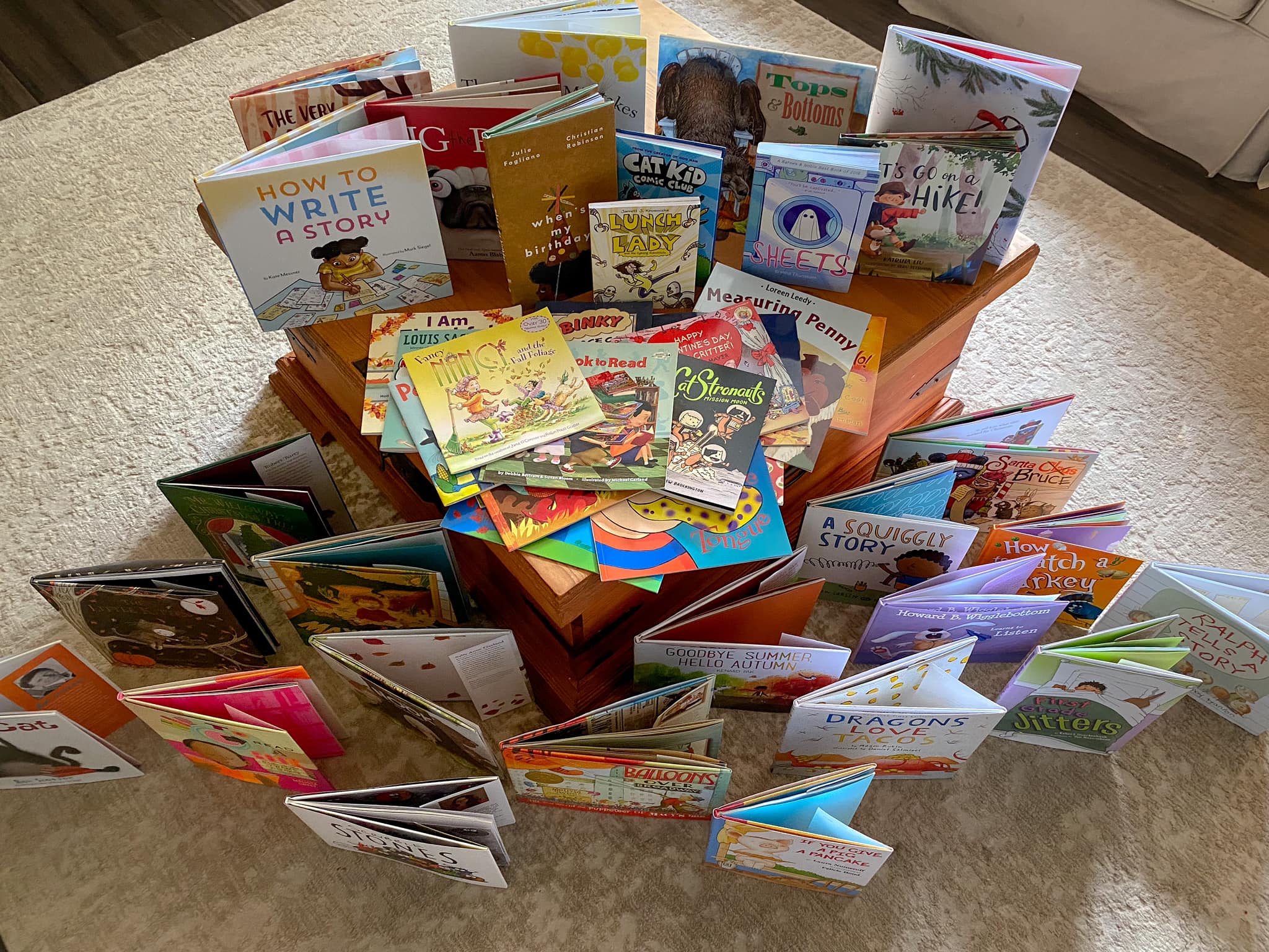 pile of children's books donated to erin by jennifer garner. 