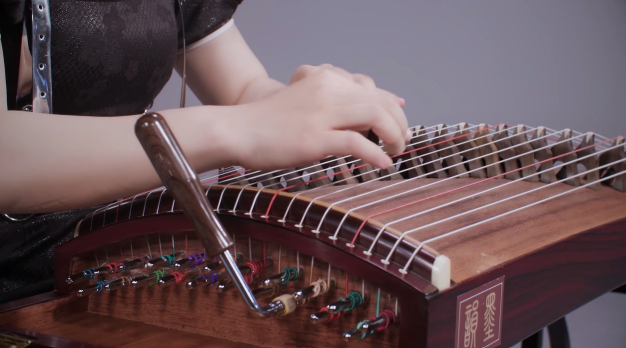 closeup of the guzheng moyun is playing.