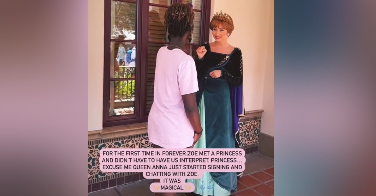 view from behind zoe Tapley as she speaks with ana at disneyland who is using american sign language to speak with her. the photo is captioned “for the first time in forever zoe met a princess and didn’t have to have us interpret. princess… excuse me, queen anna, just started signing and chatting with zoe. it was magical”