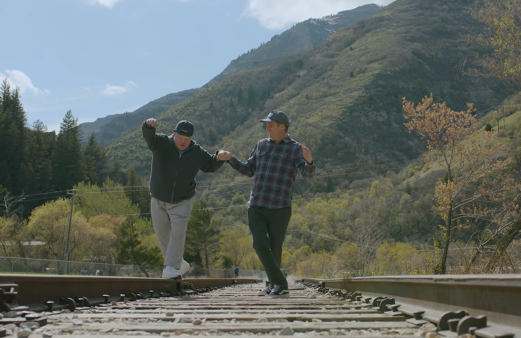 Luke Johnson and David Johnson walk on train tracks in test footage for their movie.