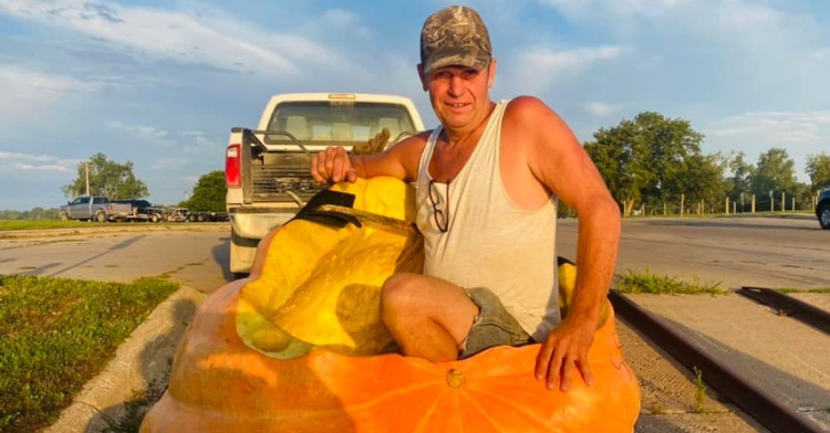 Duane Hansen and Berta the giant pumpkin