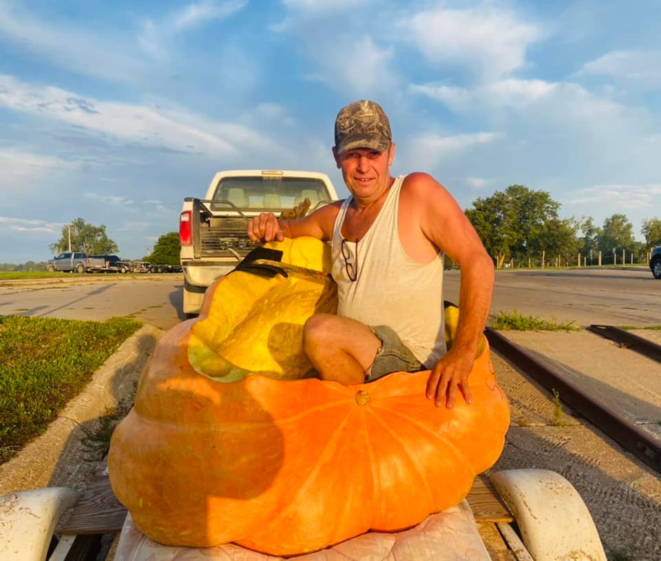 Duane Hansen sits inside 800-lb pumpkin boat called Berta.

