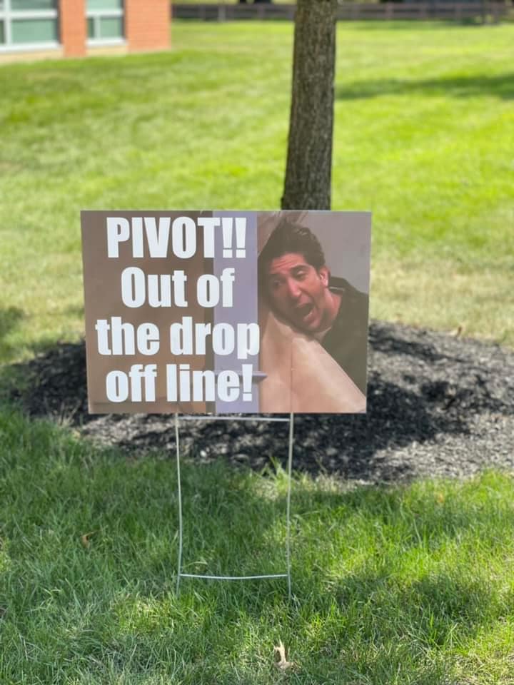 funny PTA sign with Ross from Friends and the words "Pivot!! Out of the drop off line."