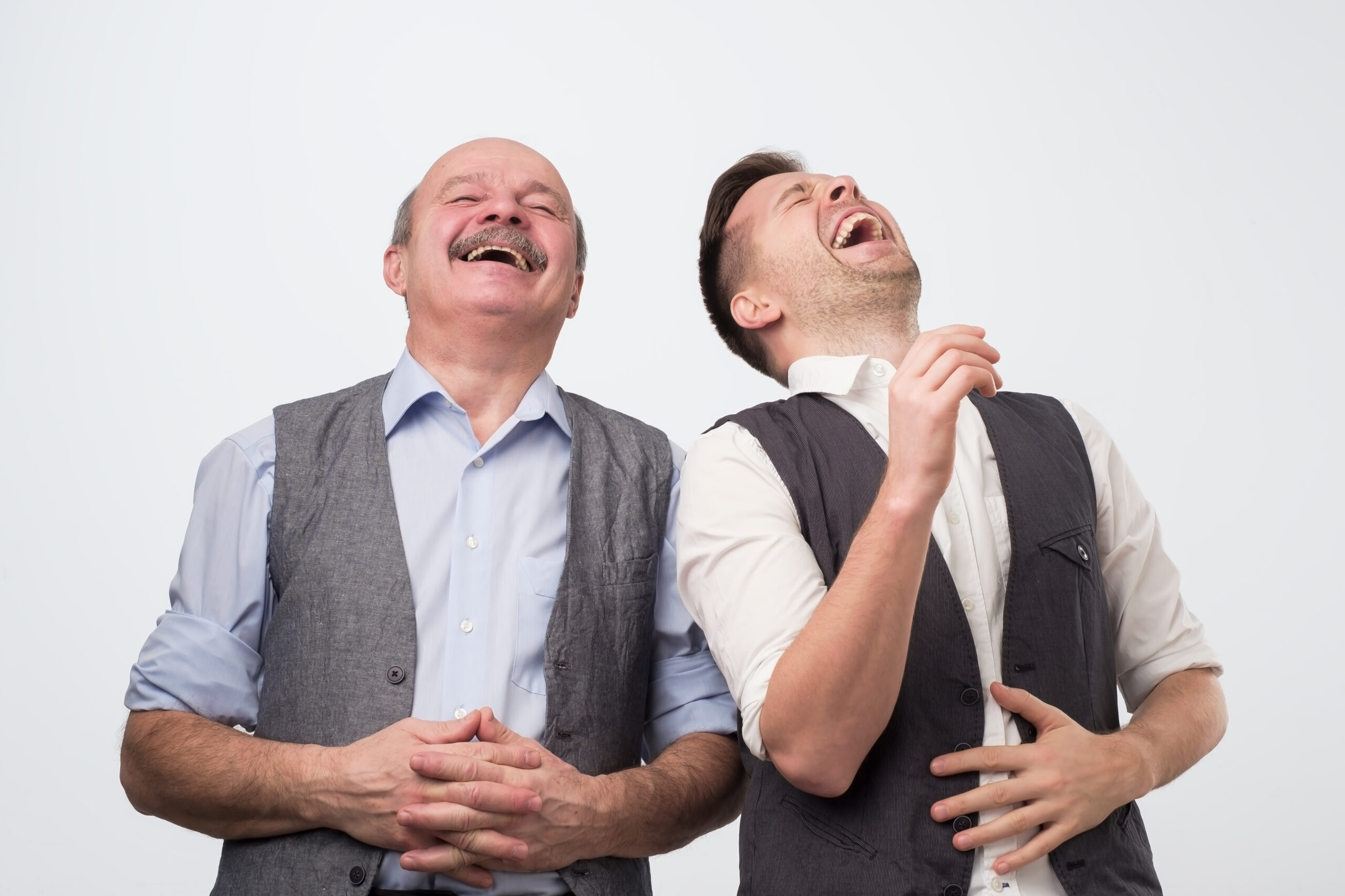 Two men laughing at a joke