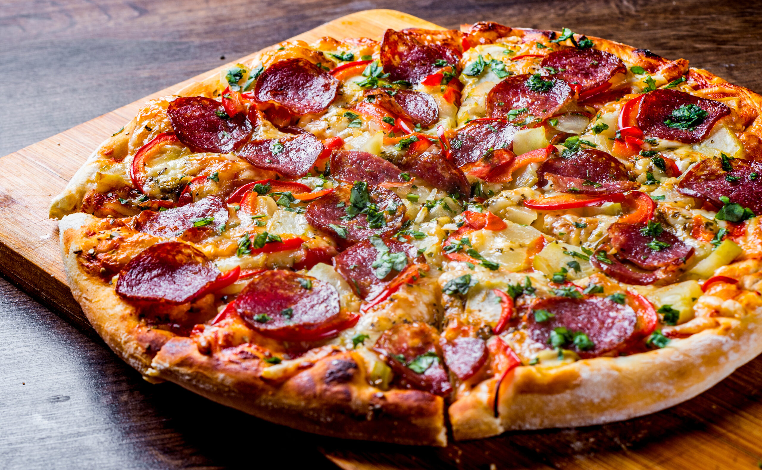 Pepperoni Pizza with Mozzarella cheese, salami, pepper.