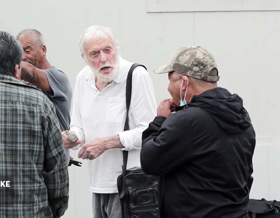Dick Van Dyke hands out money at labor center in Malibu, CA