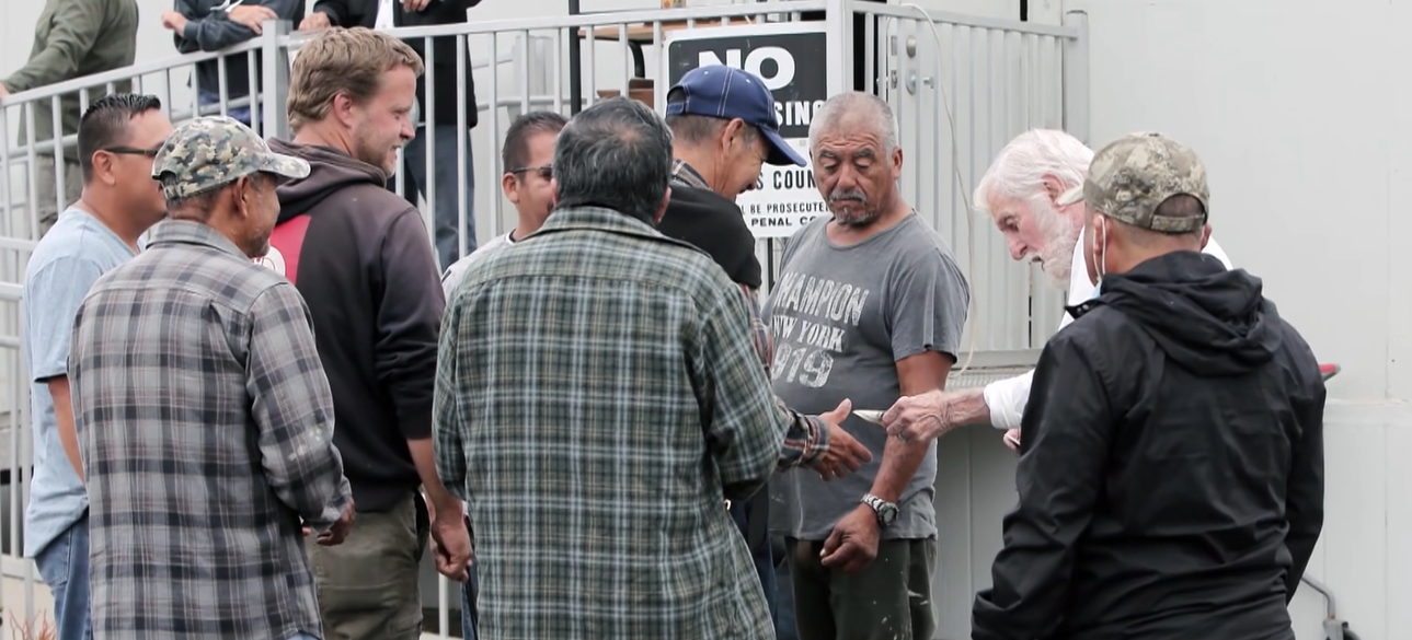 Dick Van Dyke hands out cash to people seeking work
