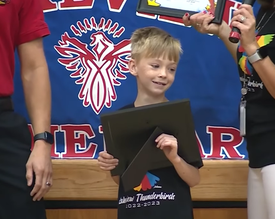 Garrett Brown receives Hero Award at Lakeview Elementary School in Norman, OK