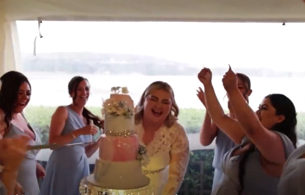 Kayley Stead smashing wedding cake
