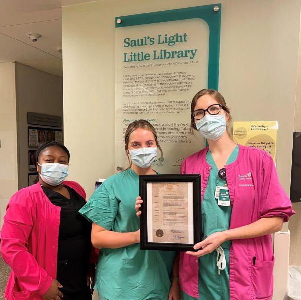 Nurses hold a proclamation announcing NICU Awareness Day in Louisiana.