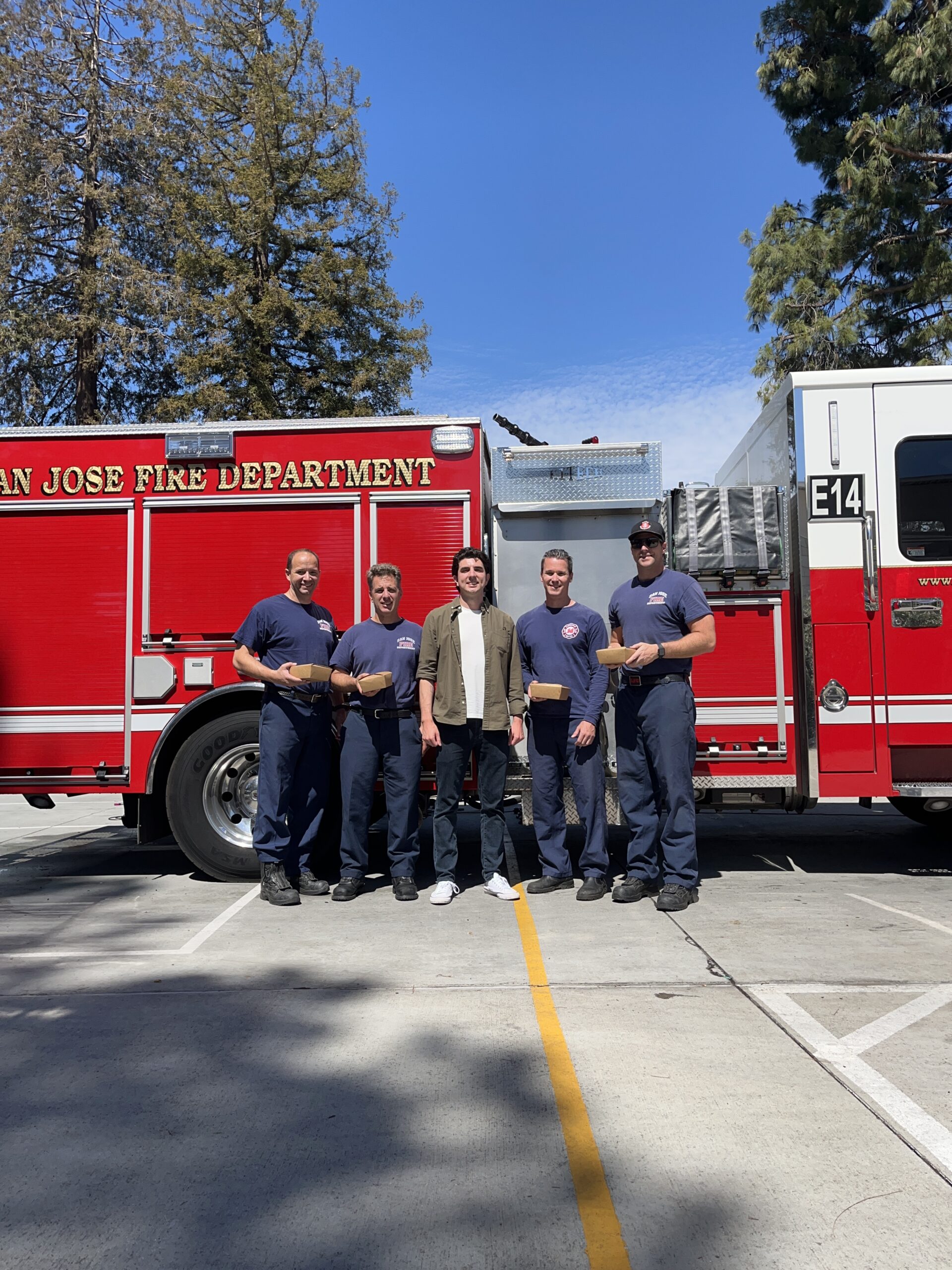 bryan tsiliacos with firefighters from the san jose police department