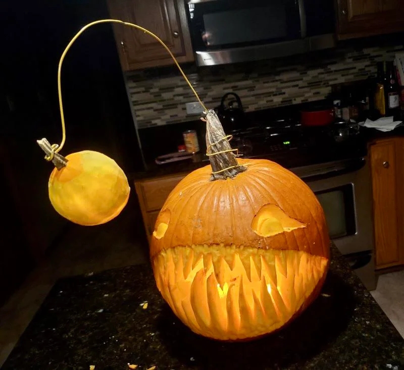 pumpkin carved to look like an angler fish