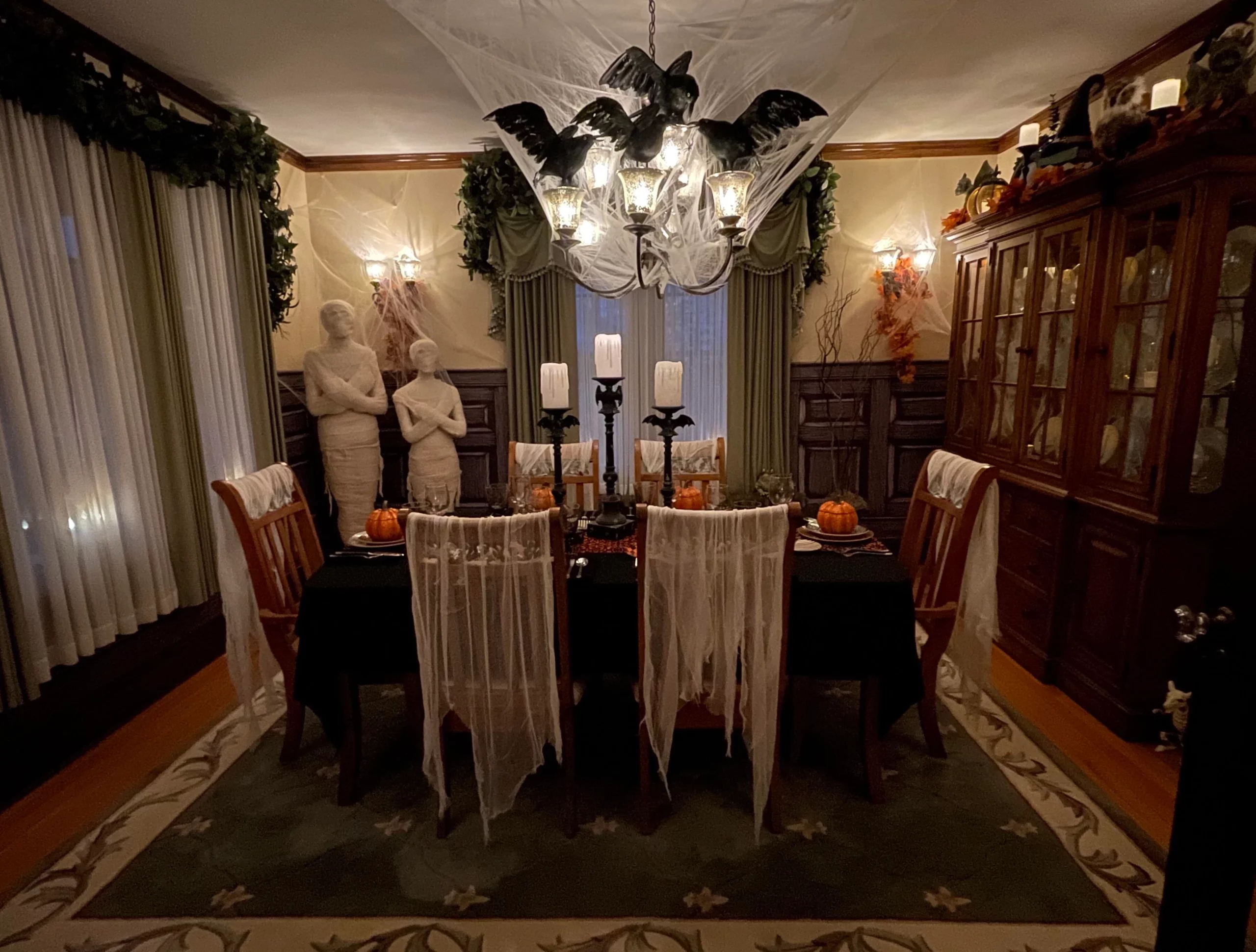 dining room decorated with Halloween themed decor.