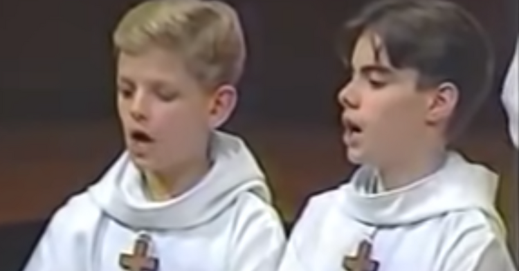two choir boys singing an opera composed of "meows."