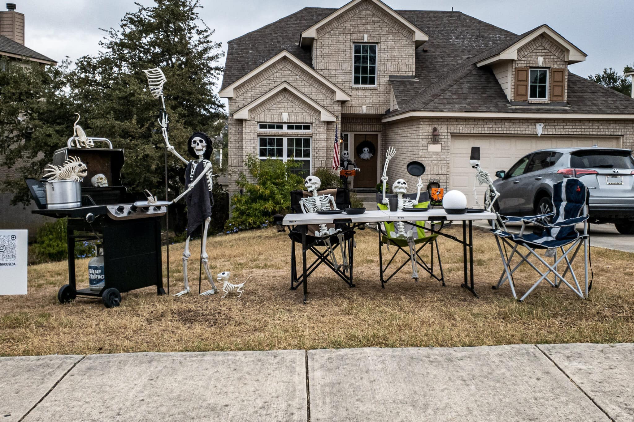 Skeleton House of San Antonio display of skeletons cooking out
