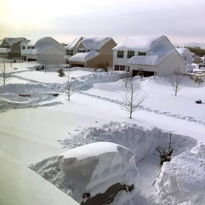 A neighborhood in Buffalo, NY blanketed in 6-7-feet of snow.
