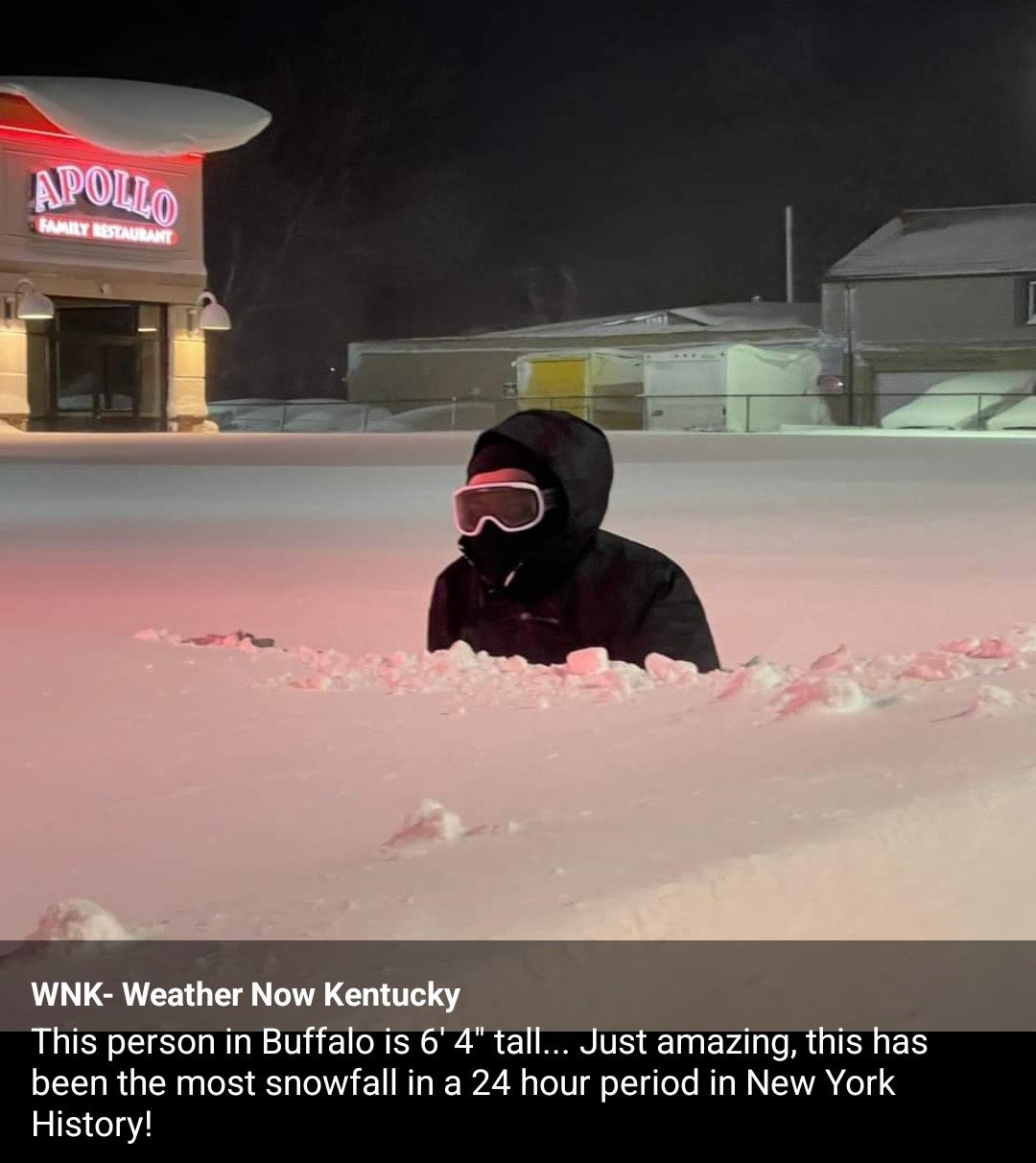 Meteorologist struggling to move through 6-feet of snow while reporting in Buffalo, NY.