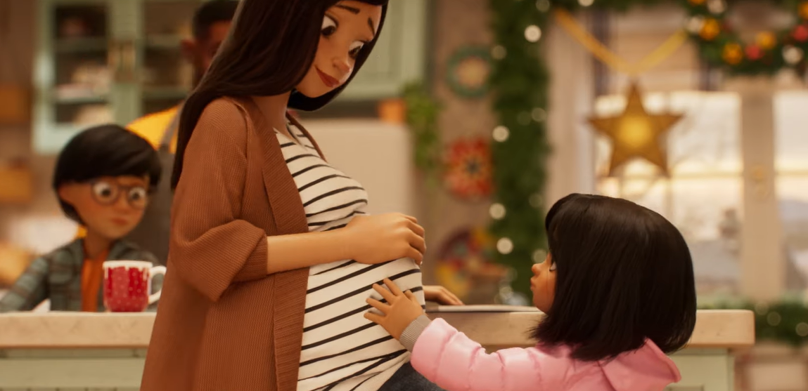 Disney and Make-A-Wish annual Christmas ad. Lola touching mama's belly.
