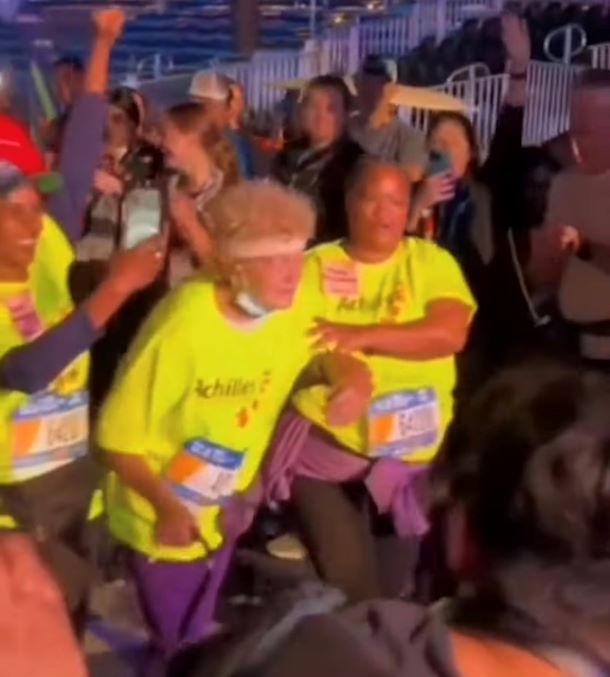 A 75-year-old woman finishes her 36th marathon.