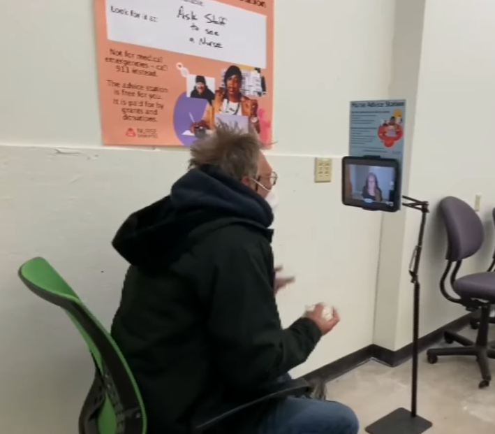 man using Nurse Disrupted kiosk
