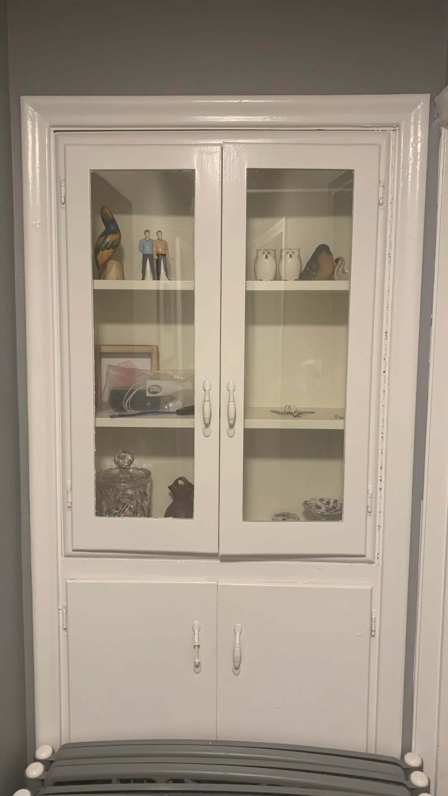 white cabinet built into the wall