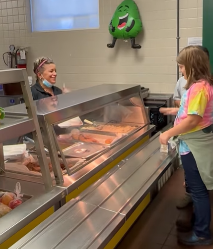 students using sign language to order lunch