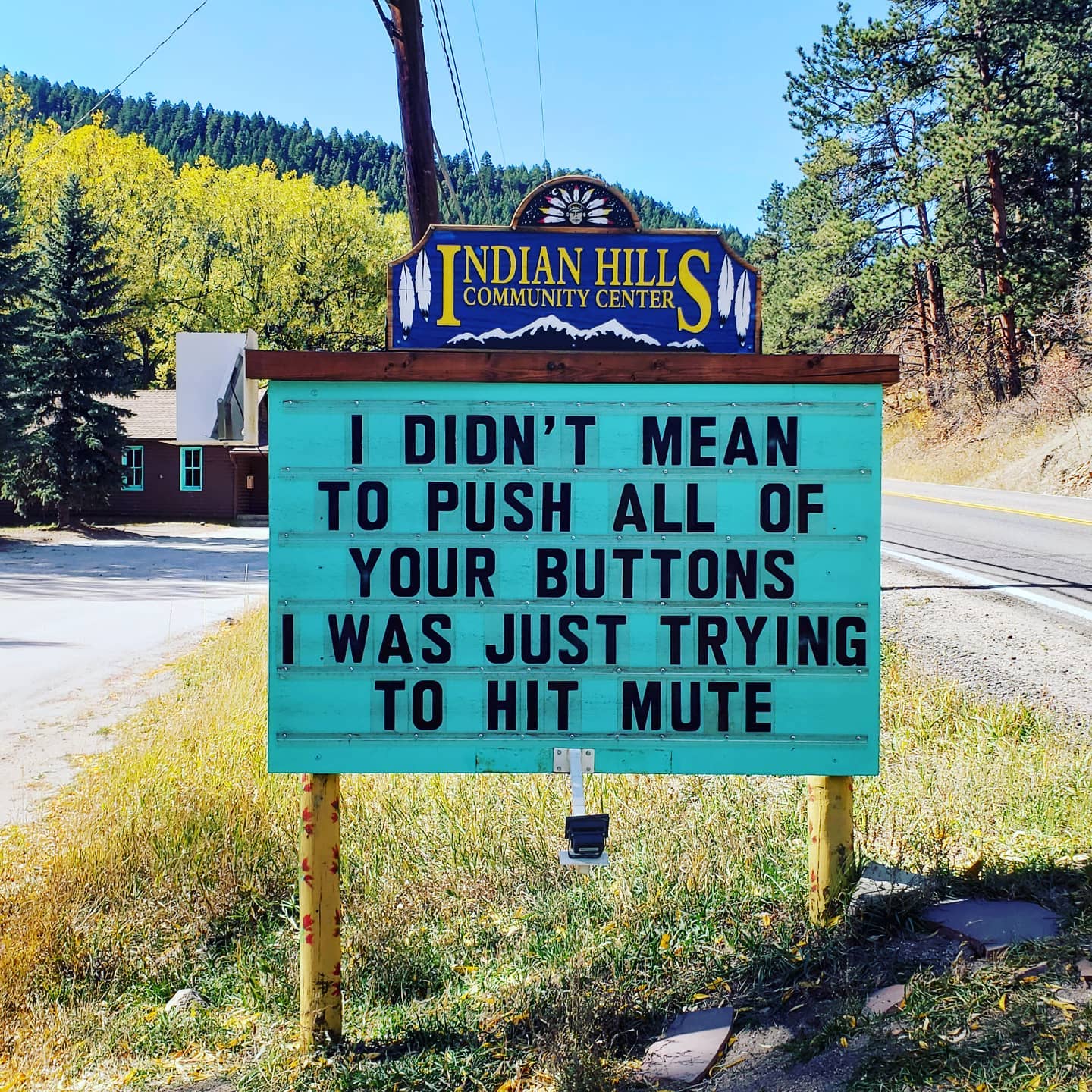 community sign that says: "I didn't mean to push all of your buttons I was just trying to hit mute."