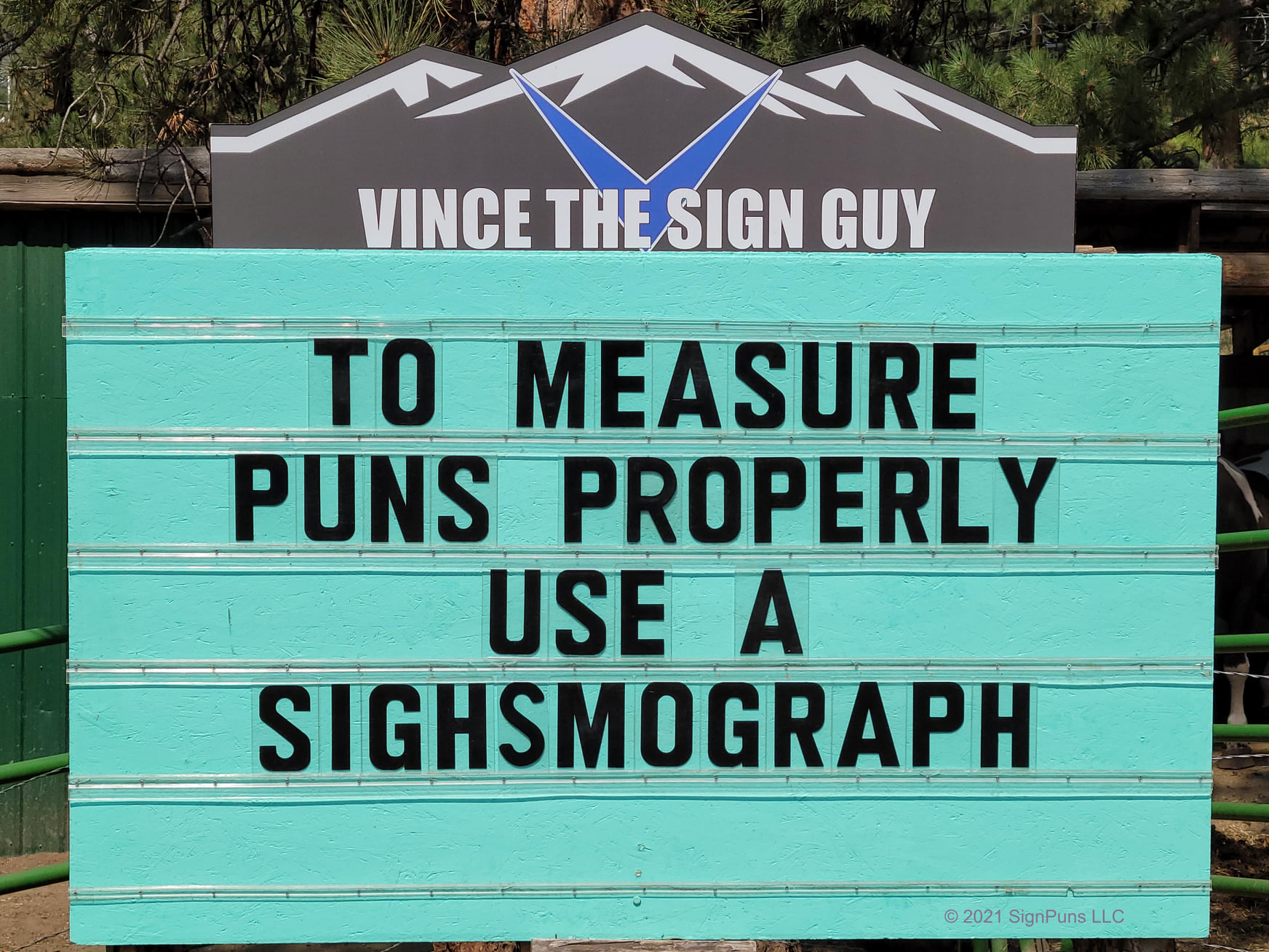 community sign that says: "to measure puns properly use a sighsmograph"