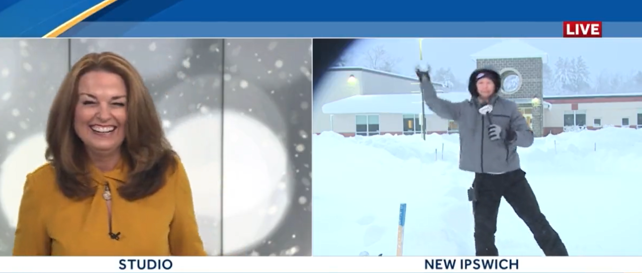Anchor Amy Covino laughs at reporter Troy Lynch during live report who, at that moment, was in the middle of throwing a snowball. 