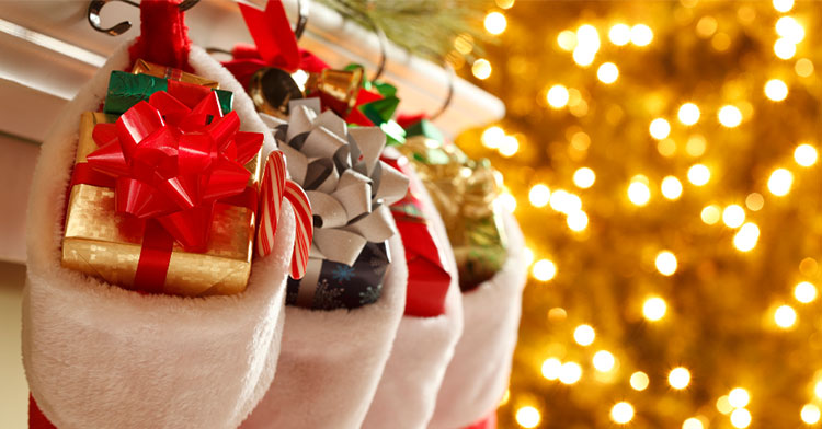 Christmas stockings hanging over fireplace