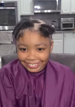Carleigh Edwards before cutting off all of her hair.