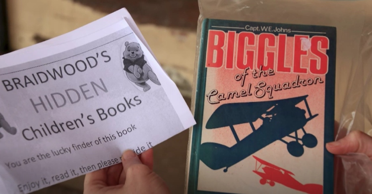 Note that says "Hidden Children's Books" with copy of book called "Biggles"