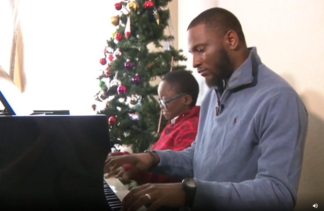Jude Nyame Yie Kofie studying piano with teacher Mr. Sullivan