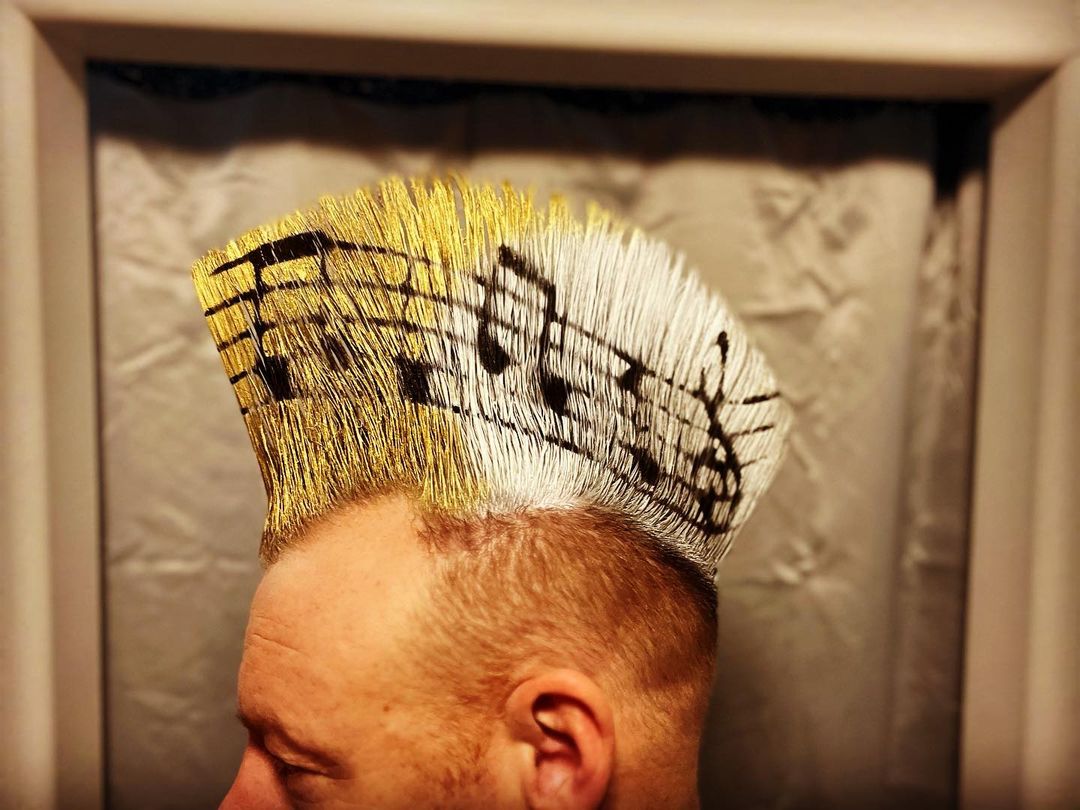Thomas "Zach" Zacharias models his Mohawk Nurse design. This one features music notes