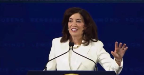 New York Governor Kathy Hochul speaking at a podium