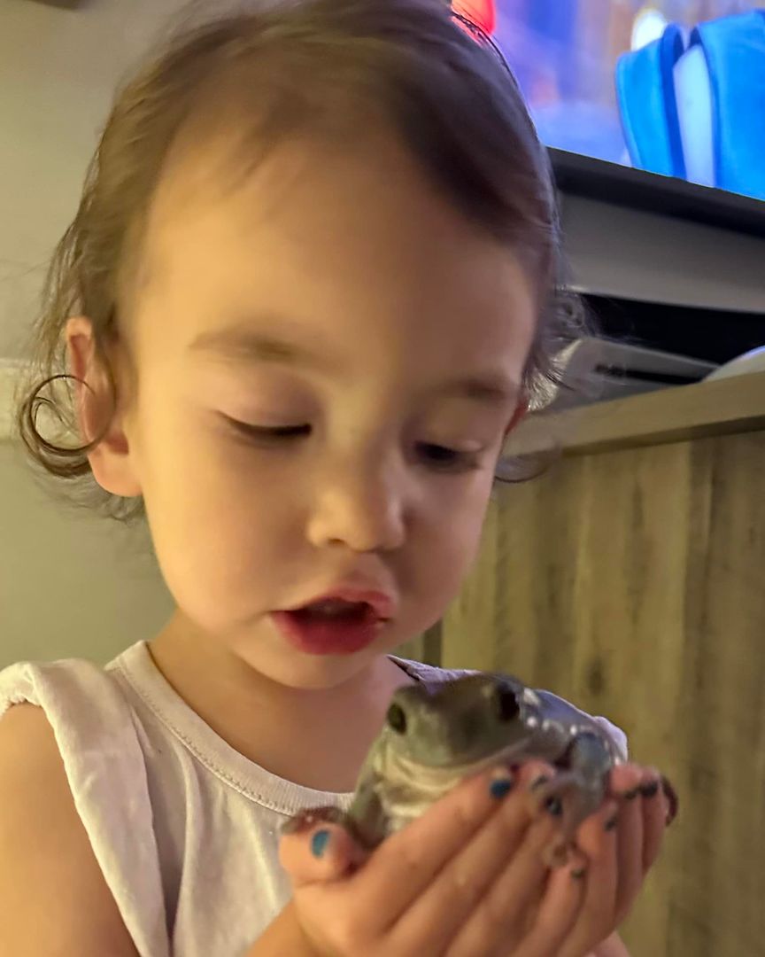 Juliana holding George the frog