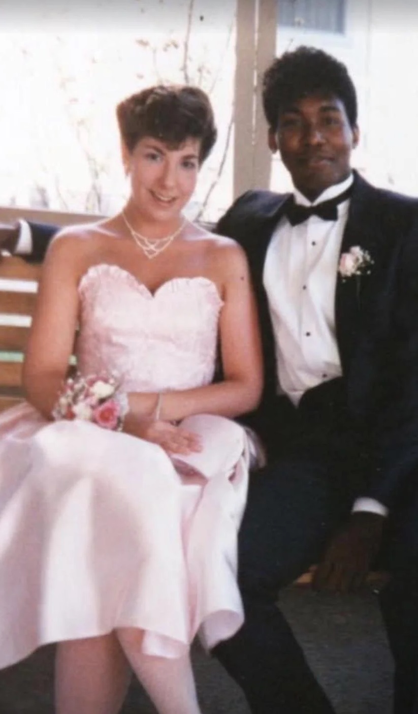 young couple dressed in prom clothes