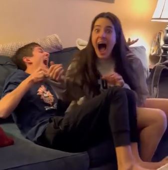 Twins Magdalena and Matthew Mylenski scream in excitement over Matthew's Harvard acceptance. 