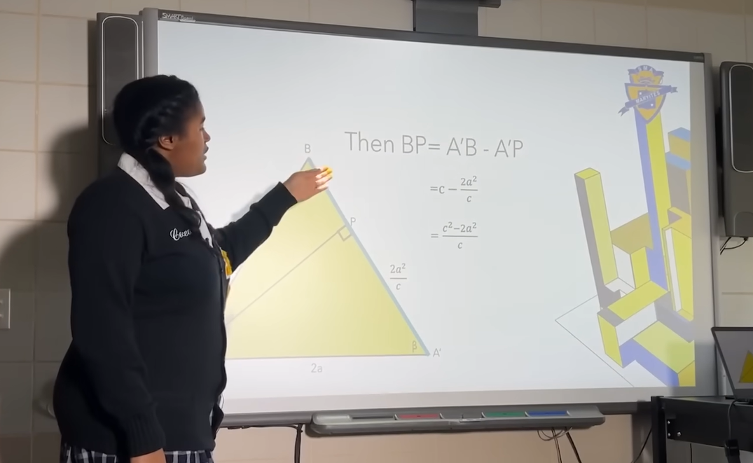 Calcea Johnson explaining theorem on white board