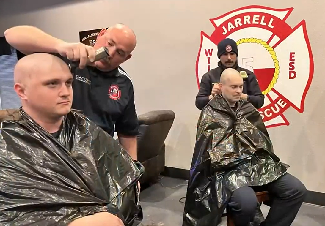Jarrell Fire Department members shave their heads for colleague with brain tumor.