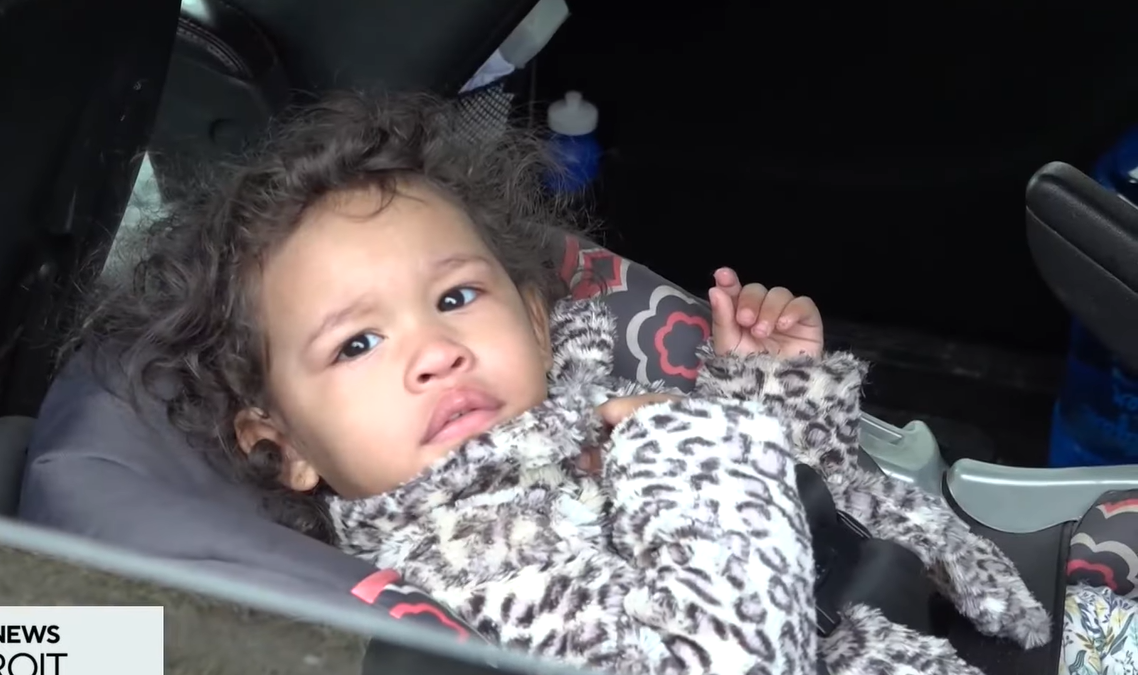 14-month-old Shantel in carseat.