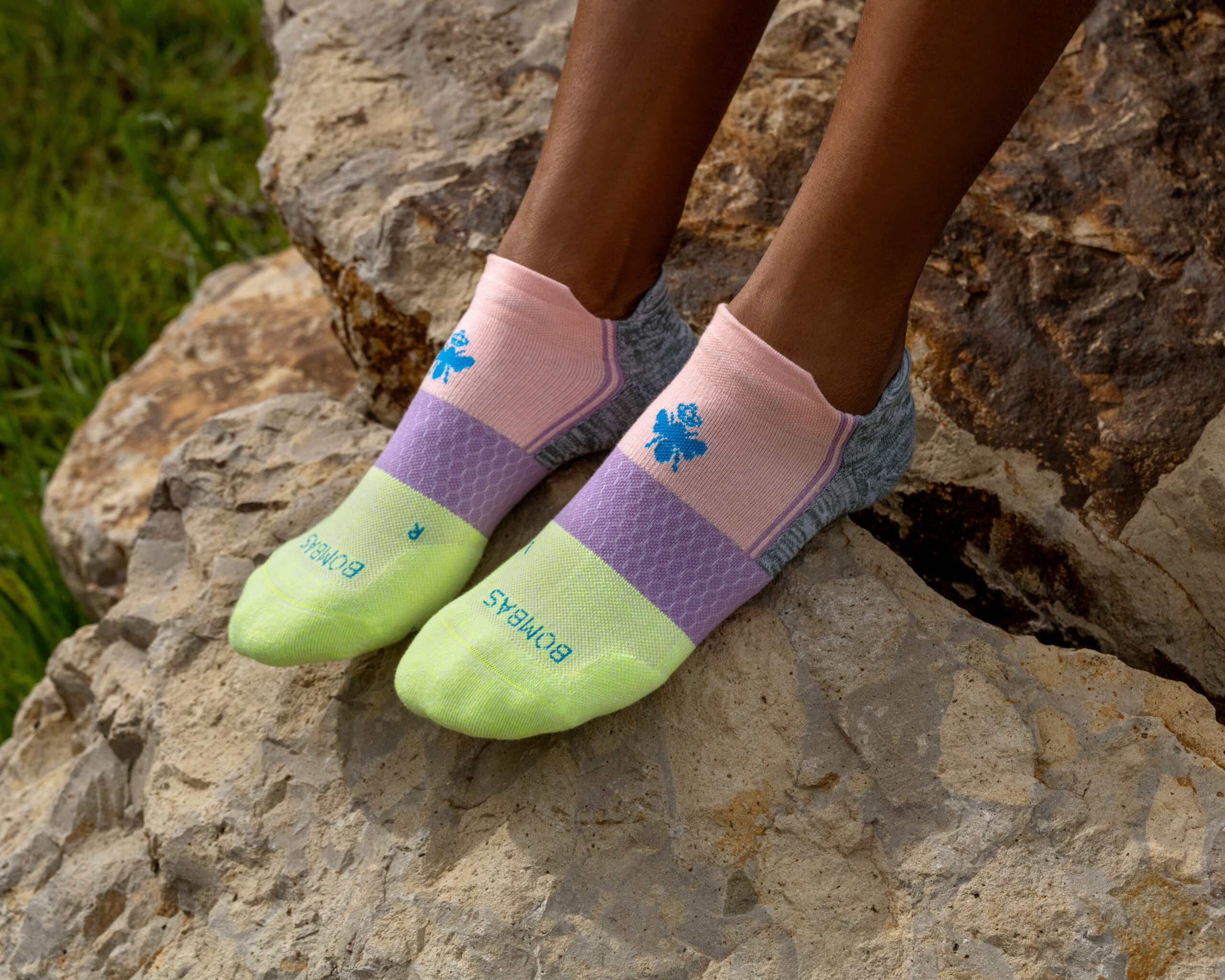 a pair of feet wearing Bombas socks