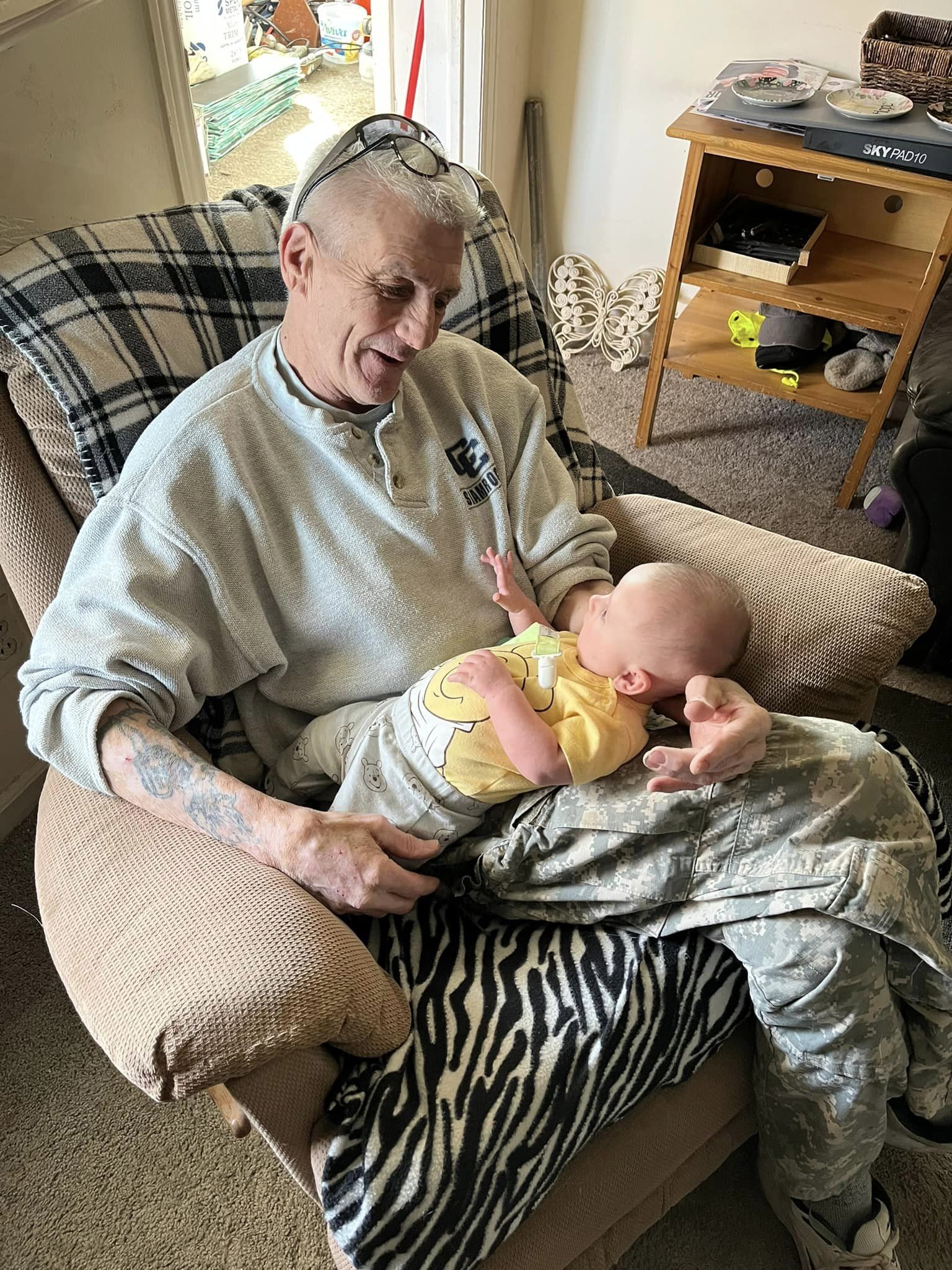 Brian Ahern holding grandson Asher.