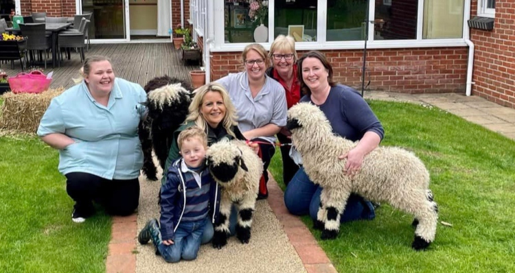 Carla Mcleod Bunter visits nursing home with three of her sheep.