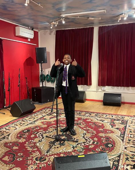 Malakai Bayoh giving two thumbs up while rehearsing for BGT