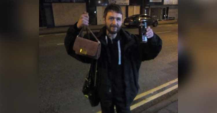 paul holding a purse and an energy drink can