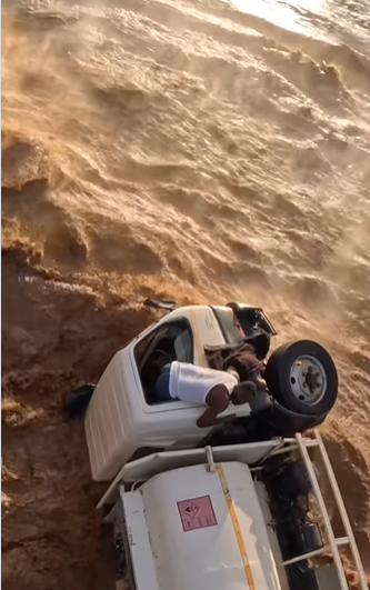 tanker driver stuck in flood in Africa