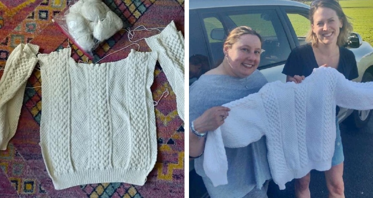 two women hold up white sweater completed by Loose Ends.