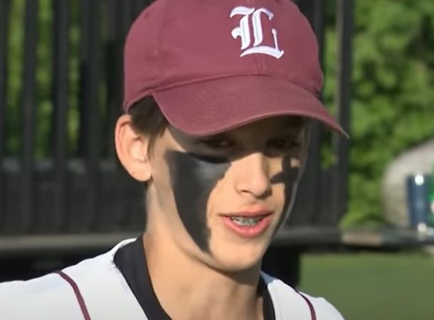 An interview with Charlie Loverme, who is wearing a baseball cap.
